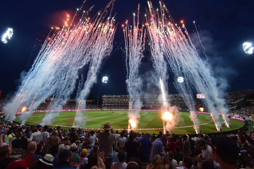 Flares going off at a cricket match
