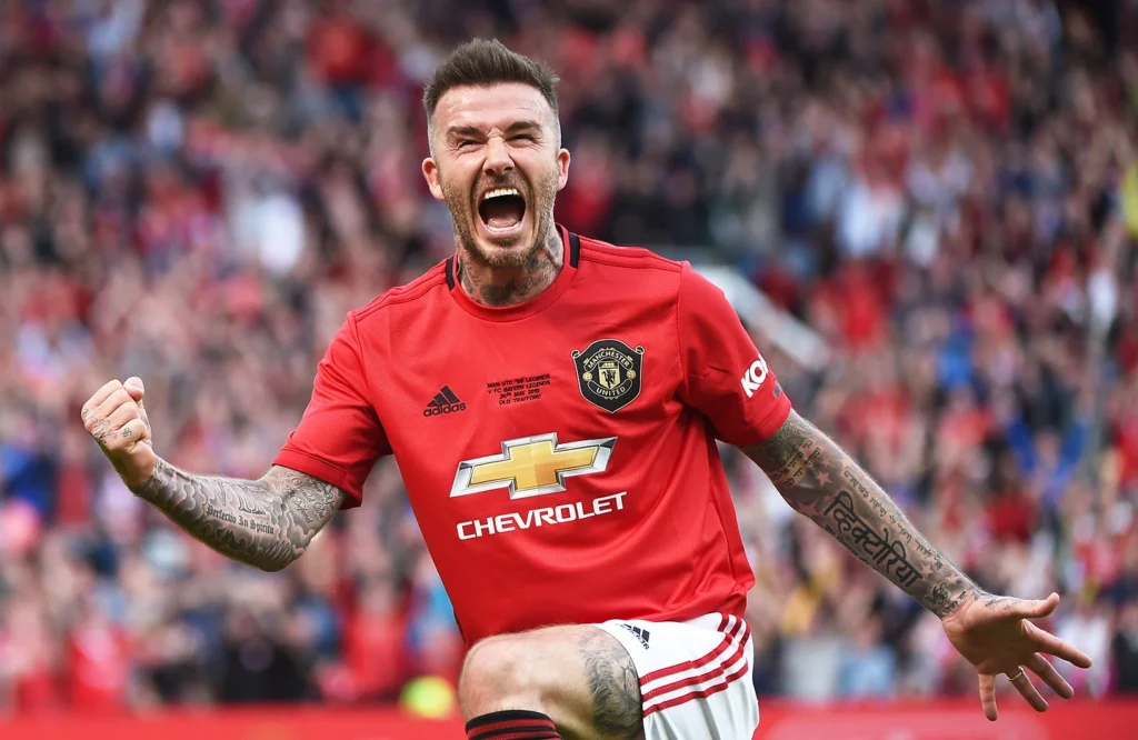 David Beckham celebrating on the football pitch