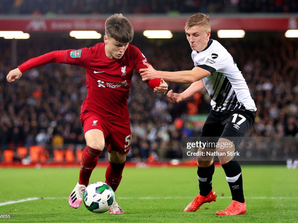 LIVERPOOL, ENGLAND - NOVEMBER 09: Ben Doak of Liverpool is challenged by Louie Sibley of Derby County during the Carabao Cup Third Round match between Liverpool and Derby County at Anfield on November 09, 2022 in Liverpool, England. (Photo by Nathan Stirk/Getty Images)