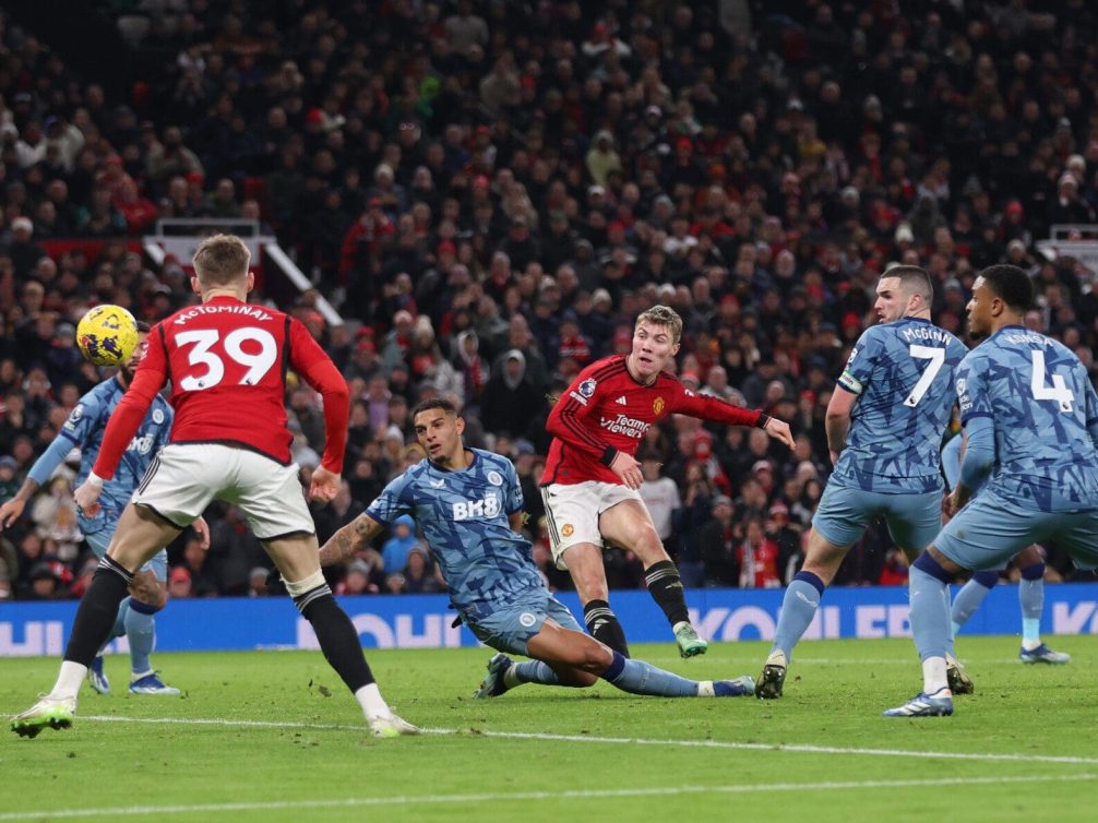 Action shot from a Manchester United match showing players in dynamic play.