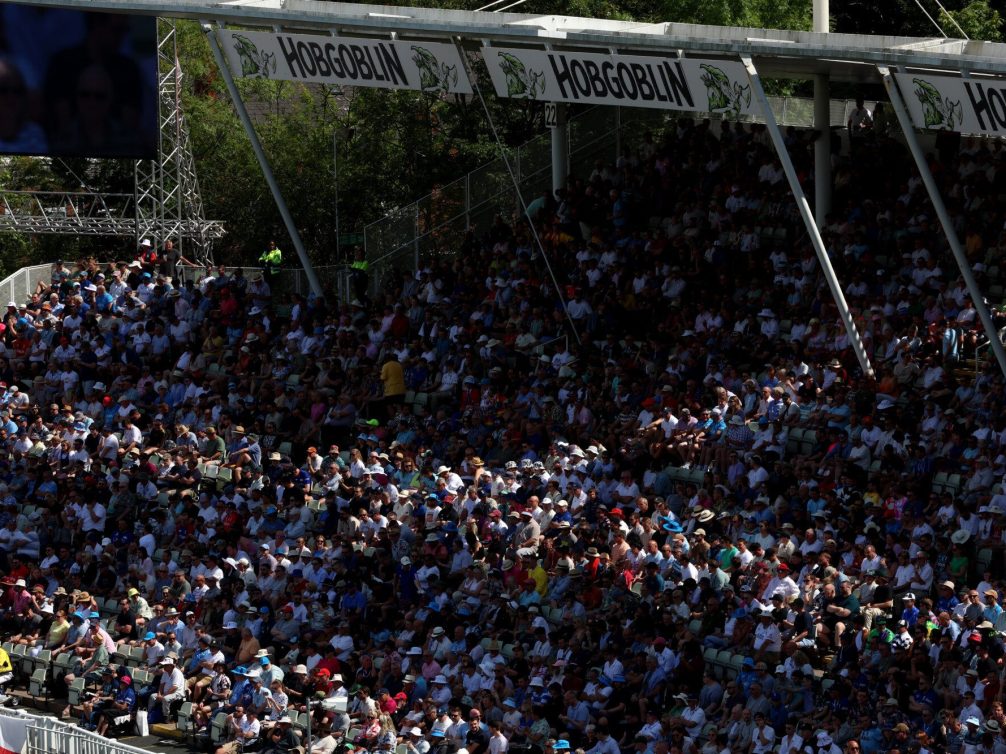 A stadium filled with spectators, highlighting the excitement of live sports.